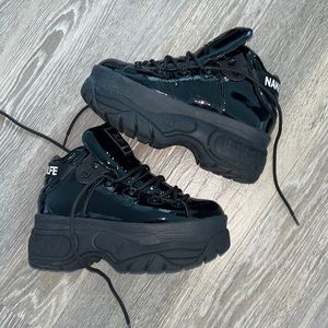 Black patent leather Naked Wolfe sneakers